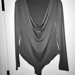 Long sleeved dressy bodysuit.